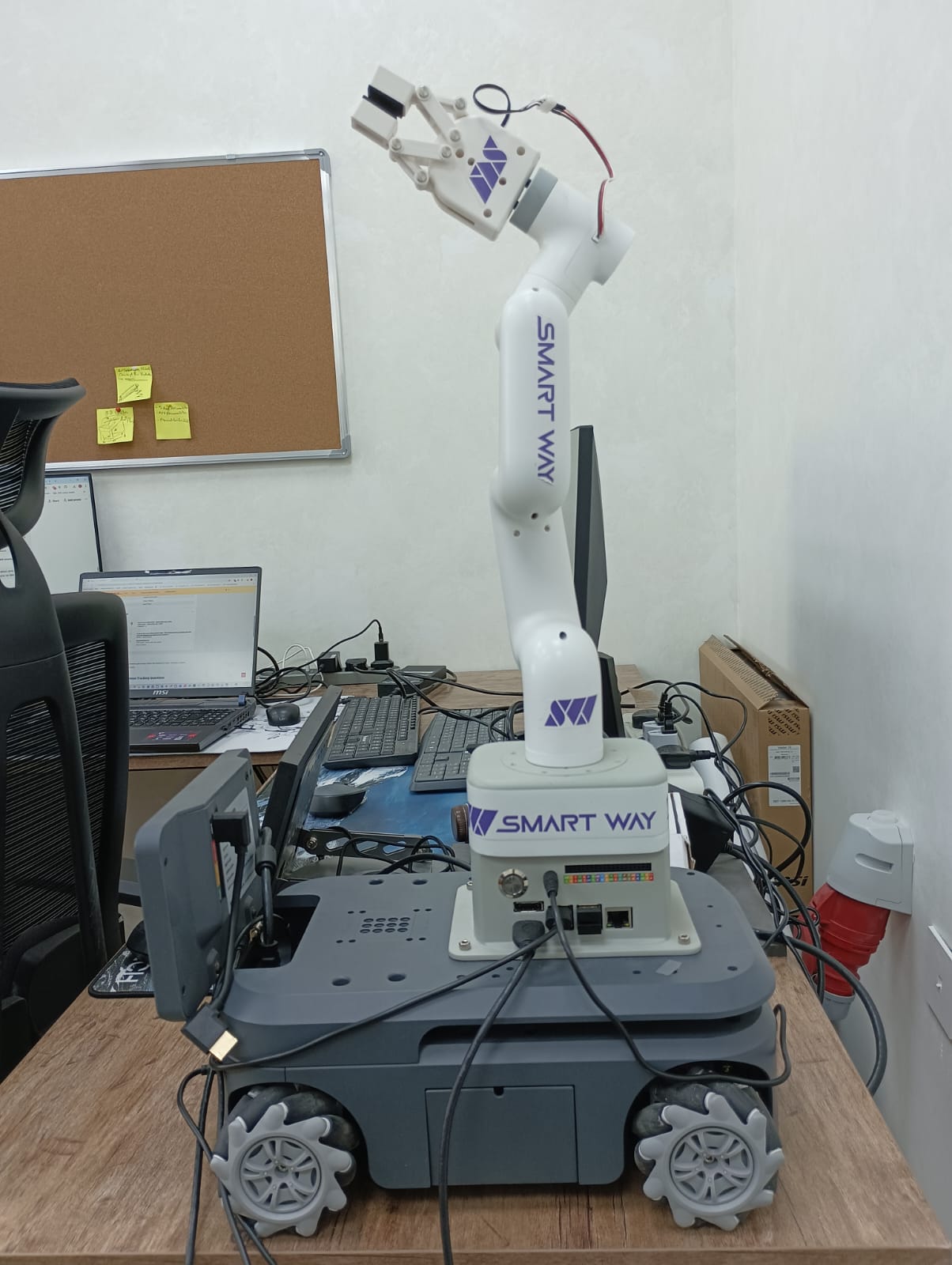 Operational configuration of mobile manipulator with onboard display